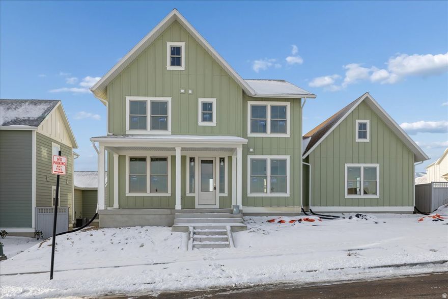 Welcome to The Arlington Farmhouse, a beautifully designed home featuring an open concept kitchen, breakfast nook, and great room, perfect for modern living. Enjoy the luxury of a vaulted primary suite with separate vanities, a free-standing tub, a walk-in shower, and a huge closet. The layout includes two flex spaces off the entry and a mostly finished basement with two bedrooms, one bathroom, and potential for additional living space. The 4-car tandem garage is extended by 5 additional feet for extra storage. Located just steps from Daybreak's Watercourse and available for move-in by year-end, this home is ideal for families seeking comfort and convenience. Don't miss your chance to make it yours!