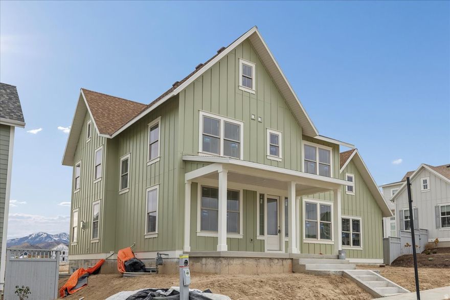 Welcome to The Arlington Farmhouse, a beautifully designed home featuring an open concept kitchen, breakfast nook, and great room, perfect for modern living. Enjoy the luxury of a vaulted primary suite with separate vanities, a free-standing tub, a walk-in shower, and a huge closet. The layout includes two flex spaces off the entry and a mostly finished basement with two bedrooms, one bathroom, and potential for additional living space. The 4-car tandem garage is extended by 5 additional feet for extra storage. Located just steps from Daybreak's Watercourse and available for move-in by year-end, this home is ideal for families seeking comfort and convenience. Don't miss your chance to make it yours!