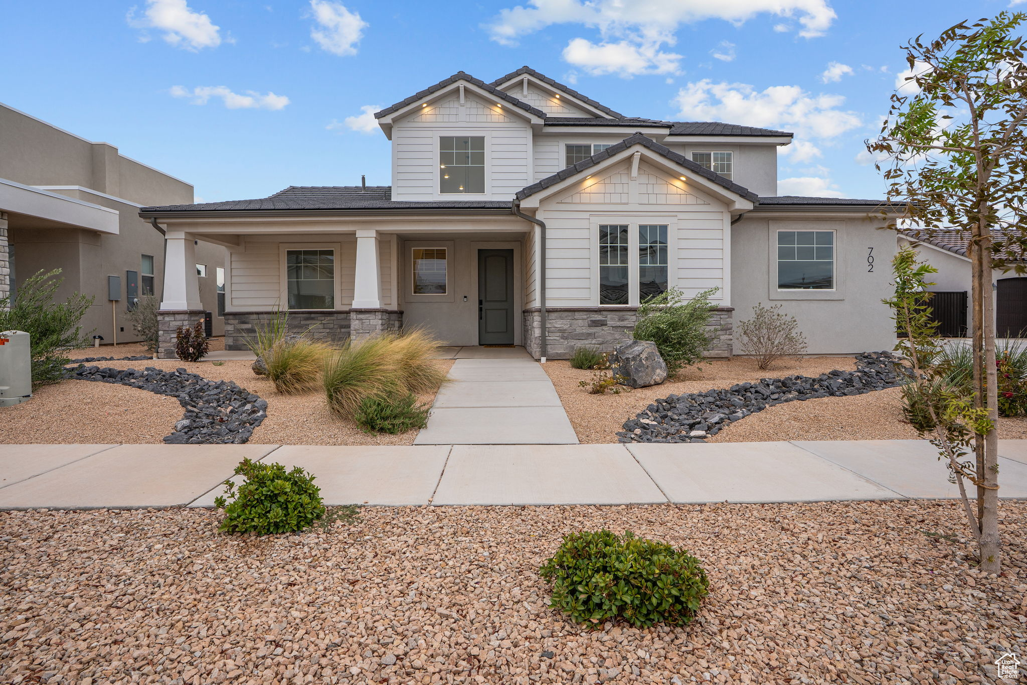 Located in sought-after Desert Color, this stunning home is filled with designer finishes and thoughtful upgrades. Gourmet kitchen features double ovens, gas range, and prewired pendants. Open great room with gas fireplace, surround sound.