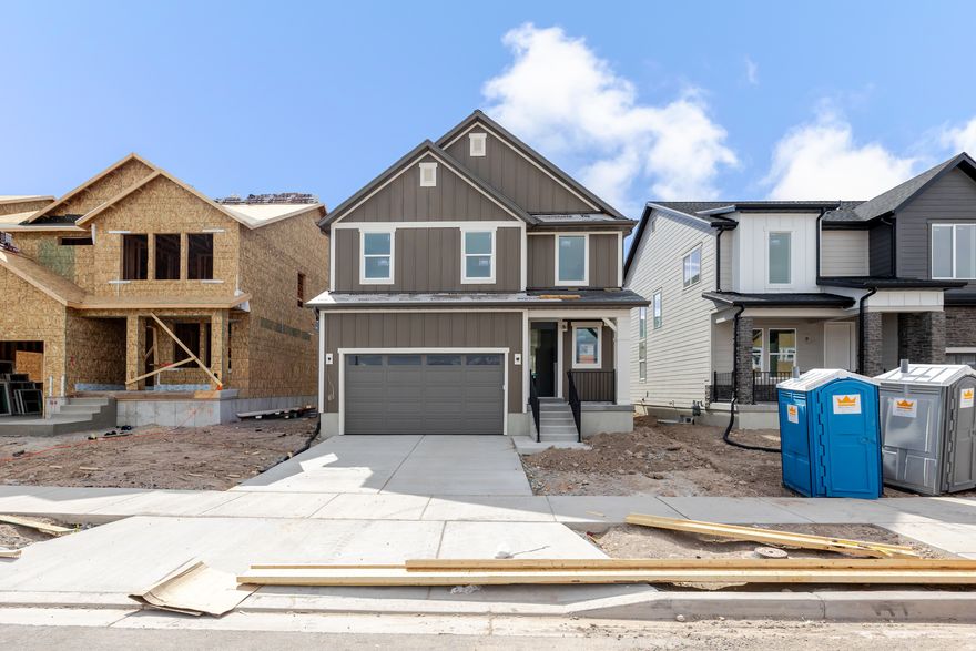 Welcome to your brand-new single-family home at River Point - where modern design meets comfort and functionality. With an open-concept layout perfect for everyday living and entertaining, this thoughtfully designed space offers both style and convenience. Enjoy the privacy of your own home while staying close to everything Lehi has to offer. As part of this vibrant new community, you'll love amenities like a clubhouse with a gym, a spacious pool, and a playground. Reach out today to learn more or schedule your visit! (JORDAN LOT 464)
