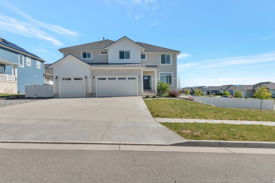 GORGEOUS HOME LOCATED IN HIGHLY DESIRABLE MOND-AIR HEIGHTS SUBDIVISION ON THE EAST BENCH OF MILLVILLE!!! WELCOME HOME!! As you enter the home you will love the spacious feeling with the 9 ft ceilings and open-concept floor plan. This home has numerous windows so you can enjoy tons of natural light and million dollars views from every level of the home.  The elegant living room is a great place to sit/read and meet with visitors. The living room flows into the heart of the home where the combination of a large family room, spacious dining room area and a high-end luxury kitchen create a truly outstanding great room! Kitchen has oversized custom cabinets, a large quartz island and bar, huge pantry, gas stove, office nook area, and so much more. The second story boasts 4 large bedrooms, 2 spacious bathrooms, big laundry room, and a bonus room/front office area. The oversized primary suite is a must see! It is such a wonderful space that includes an enormous bedroom and bathroom that has double sinks, two person shower, stand alone soaking tub, and a spacious walk in closet.  The walkout basement with day-light windows has a newly finished mother-law apartment with updated kitchen, dining room area, family room, two bedrooms, two bathrooms, laundry room, and tons of storage area.   The spacious .40 acre corner lot has so much to offer as well.  You will love the easily maintained manicured yard that features cement curbing and beautiful landscaping. You will absolutely love the mountain/valley views and watching sunsets from the large covered backyard deck. The fully fenced back yard also has a fire pit area and basketball/pickle ball court! RV parking area and space to park you trailer/4 wheelers/ATVS  CALL TODAY AND SCHEDULE YOUR PRIVATE VIEWING OF THIS AMAZING GEM!  Square footage figures are provided as a courtesy estimate only and were obtained from county records.  Buyer is advised to obtain an independent measurement.