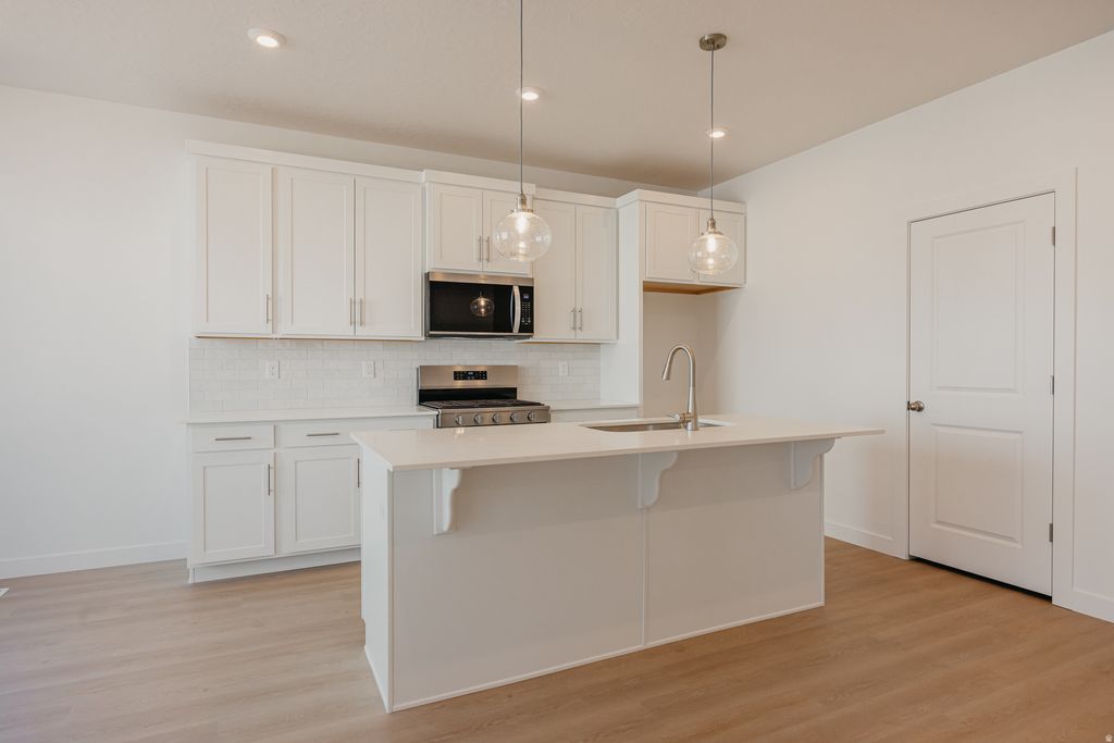 Photo of 5332 S CENTURY WAY W #111, Riverdale, UT 84405 (MLS # 2135618)