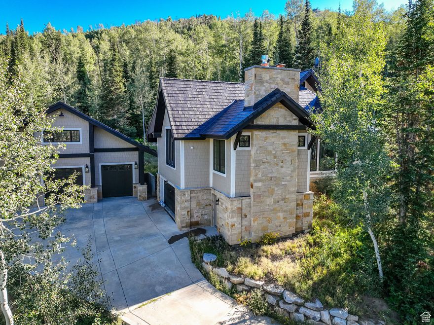 Tucked near the summit of Big Cottonwood Canyon, this remarkable 2.22-acre retreat offers unmatched privacy and sweeping skies. Located just one mile from Big Cottonwood Canyon Road and Solitude Ski Resort, the property includes three parcels-creating a rare, private sanctuary in one of Utah's most stunning alpine settings. This home isn't just a seasonal getaway-it's fully permitted for year-round living, so you can enjoy the ever-changing mountain landscape throughout the year. Thoughtfully designed with natural materials and expansive windows, the architecture celebrates its surroundings, blurring the lines between indoors and out. From antique European wood beams to a custom fireplace in the primary suite, every detail has been handpicked to blend warmth, character, and artistry. A finished third-story loft provides flexible space for work, play, or relaxation. An impressive five-car detached garage includes an upper-level recreation and storage room-perfect for all your gear and hobbies. Don't miss your chance to own a piece of secluded mountain paradise. Schedule your private tour today and experience the peaceful lifestyle this property has to offer. Sale includes parcels 24-26-178-001 and 24-26-178-028. Buyer to verify all information, including square footage and MLS details.