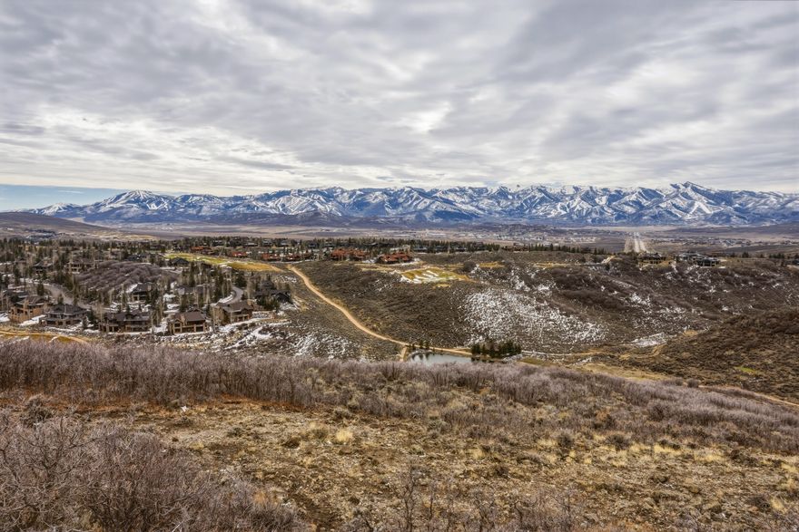 Signature Estate Homesite in Pinnacle at Promontory | 5.12 Acres | Panoramic Ski Resort Views -- Located within the ultra-exclusive Pinnacle at Promontory, 4157 Pinnacle Sky Loop presents one of the most exceptional estate homesites in Park City's Promontory Club. Spanning 5.12 acres, this remarkable property is among the largest homesites in Promontory and offers an ideal building envelope for creating a truly spectacular mountain estate. From its elevated setting, the homesite captures sweeping panoramic views of Park City's iconic ski resort skyline, including Deer Valley Resort, Park City Mountain Resort, and the Canyons Village area, along with vistas toward Utah Olympic Park and dramatic western sunsets. The property also enjoys a stunning vantage point overlooking the Pete Dye Canyon Course, blending world-class golf scenery with some of Park City's most recognizable mountain views. Full Golf Membership available via separate purchase, providing the opportunity to enjoy Promontory's championship golf and extensive club amenities. Pinnacle is an intimate gated enclave within Promontory designed for estate-scale living, with expansive homesites positioned to capture panoramic mountain vistas. A private Pinnacle clubhouse is currently under construction, further elevating the lifestyle offered within this exclusive neighborhood. The current owners have commissioned plans for a spectacular 12,000+ square foot luxury residence, offering the next owner a head start toward creating a landmark mountain retreat. Promontory spans over 7,200 acres and features championship golf by Pete Dye and Jack Nicklaus, multiple clubhouses, dining, spa and fitness facilities, equestrian amenities, family recreation, a beach-style lake club, and miles of scenic trails. Located just minutes from Park City's world-class skiing, dining, and historic Main Street, this extraordinary homesite represents one of the finest opportunities to build a signature estate within Promontory.