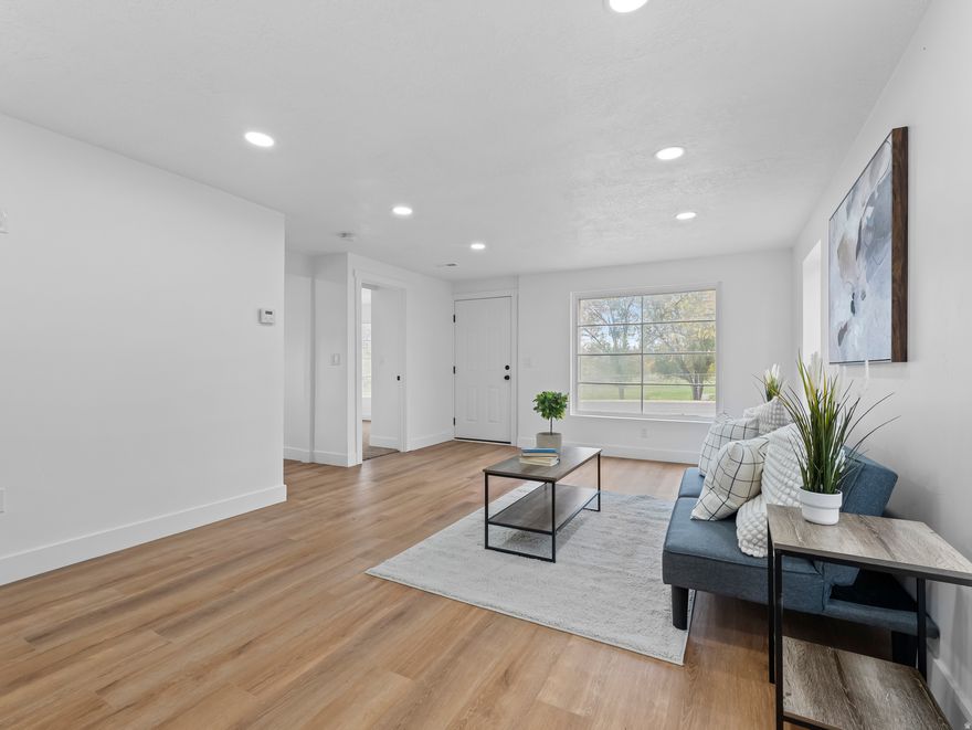 PRICE IMPROVEMENT!! SELLER WILL PAY BUYERS CLOSING COSTS & PAY FOR APPLIANCES OR SOD! Beautifully Remodeled, 6 Bedroom 3 Bathroom ( Master bedroom on the main floor features an ensuite bathroom) 2 kitchens 2 Laundry giving you the perfect mother-in-law apartment to help pay for the mortgage or build generational wealth. Come see this Gem in a great area of Murray, located just minutes away from the mountains and downtown restaurants, grocery stores and more! EVERYTHING HAS BEEN UPDATED! Tile, LVP, Windows, Doors, Cabinets, Toilets, Tubs, Roof, Furnace, Water Heater, AC, Plumbing, Electrical, Garage door and much more!! This Gem also features a long driveway, 2 car garage and plenty of parking space. Come get this cutie today!! All information deemed accurate and true. Buyer to verify everything.