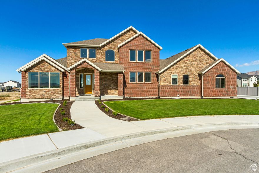 Stunning custom home in the exclusive Pier gated community with access to a private lake. This beautifully built, high-end residence offers exceptional craftsmanship and upscale finishes throughout. right as you open the door you are welcomed by a grand oversized staircase and open-to-above family room featuring a double-sided fireplace that flows into the large dining room. Main floor also has a large formal living room and office. Kitchen is open and spacious with HUGE walk-in-pantry. This is your chance to live in an amazing home within a truly exceptional community-don't miss it!