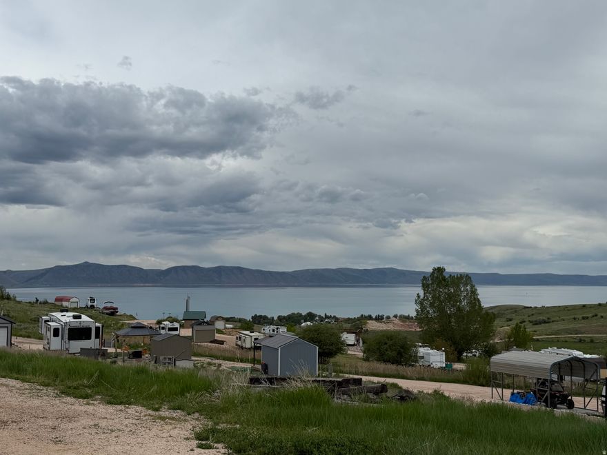 Enjoy the best of Bear Lake from this exceptional RV lot tucked away in a quiet cul-de-sac in the desirable Bear Lake RV Park. This premium lot offers beautiful views of Bear Lake and features a spacious, flat setup area, making it ideal for relaxing and entertaining. Backing directly to common area, you'll appreciate the added privacy and open feel with no immediate rear neighbors. Whether you're looking for a weekend getaway or a seasonal retreat, this lot provides the perfect combination of scenic views, easy access, and a peaceful cul-de-sac location. HOA also has playgrounds, swing set, and basketball court area to enjoy. Don't miss this opportunity to own your own piece of Bear Lake paradise!
