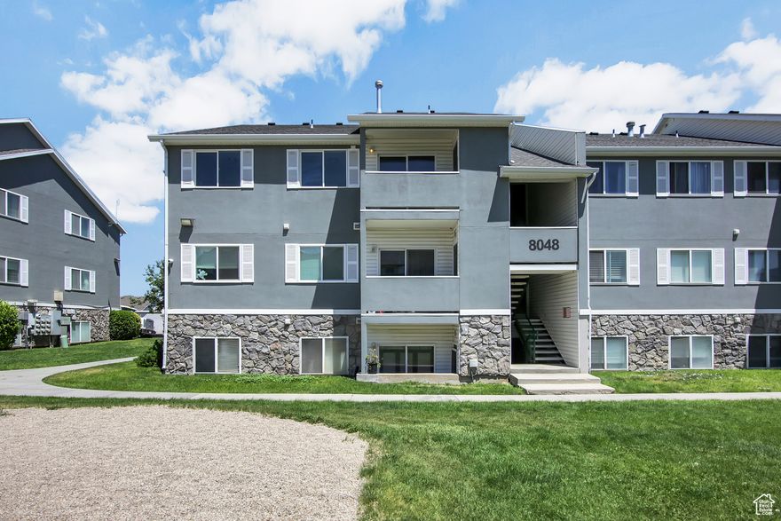 Your FIRST HOME and in an FHA APPROVED and gated community! Top-floor, 3-bed, 2-bath condo in the desirable Copper Creek gated community in Magna. This move-in ready home features vaulted ceilings, fresh paint, new LVP flooring, new carpet, & AC. The open layout includes a spacious Great room with access to a private balcony with storage, plus a large kitchen, pantry cabinet, and adjacent laundry room (with washer & dryer). The primary suite offers a walk-in closet and private bath.  Two additional bedrooms for guests or office space. Enjoy two designated parking spots (one covered) and ample guest parking.  An additional Storage Room (not all condos have this additional storage room)  is located next to the Entry door.  This FHA_approved community offers fantastic amenities:  water, sewer, garbage, snow removal, exterior maintenance, landscaping, clubhouse, & playground. Located near parks, shopping, dining, and quick freeway access. Easy to show-don't miss your chance to call this affordable gem, Home!