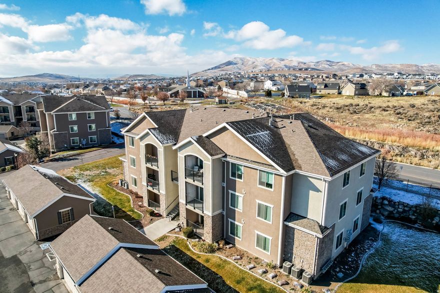 Top Level Condo, with vaulted ceilings and pleasant peaceful views, are a highlight at this beautiful 3 bed, 2 bath condo! Inside you'll find a large kitchen with newer stainless steel appliances, 2 year old water heater and 3 year old furnace all adding peace of mind and value!  You'll love the fabulous views from your private balcony, the owners suite with walk-in closet and private full bathroom.  Separate laundry room offers additional storage, a folding station & the 1 year old washer and dryer can be included!  Parking is a breeze with a single car garage & a reserved parking spot! Location is key, fast access to freeways, minutes to Silicone Slope & SL County, close to shopping, entertainment and within walking distance of Harvest Elementary School. 24 hours notice to show please!