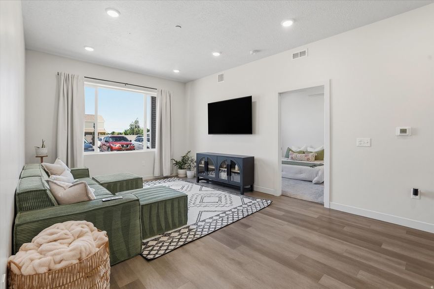 Experience easy modern living at The Morrelli at Meadowbrook. Nestled in a quieter corner of the community, this desirable main-level condo offers added privacy, fewer shared walls, abundance of natural light, and the convenience of effortless access.   Inside, you'll find a bright open layout with contemporary finishes, spacious living spaces, and a clean modern aesthetic designed for comfortable everyday living. The low-maintenance lifestyle is complemented by HOA-covered water, sewer, trash, and basic internet service.   Located just minutes from shopping, dining, mountain recreation, downtown Ogden, Weber State University, and convenient freeway access, this home offers both connection and convenience in all directions.   Flexible ownership opportunities available, including seller financing and lease-to-own options with approved terms. A rare opportunity for buyers seeking affordability, flexibility, and modern comfort in a growing Ogden community.   Square footage figures are provided as a courtesy estimate only and were obtained from county records. Buyer is advised to obtain an independent measurement.