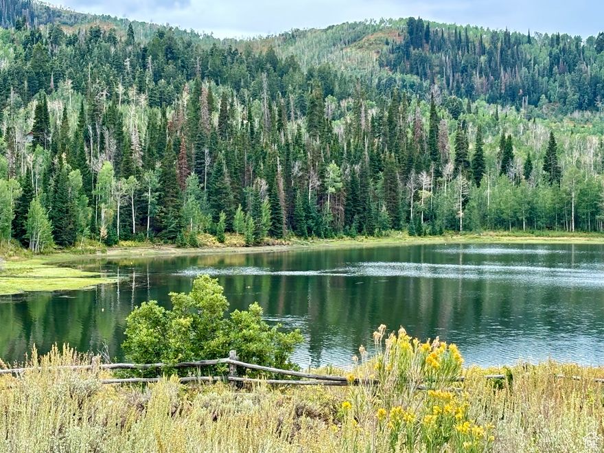 Pictures do not do it justice! Experience the rare opportunity to own a legacy property in Timberlakes. This expansive 7.79 acre lot - a true rarity for the community - offers sweeping mountain and lake views that will take your breath away. The property backs hundreds of acres of land that will likely never be developed, ensuring unmatched privacy, serenity, and a lasting connection to nature. Positioned for easy access while still feeling worlds away, this homesite is ideal for creating your dream mountain retreat. Imagine waking up surrounded by aspen trees, endless wildlife, and panoramic vistas, all while enjoying the peace and quiet of your own secluded escape. Timberlakes offers the perfect balance of mountain living and convenience, with year-round access just minutes from Heber Valley, Jordanelle Reservoir, and world-class recreation. With its size, location, and unparalleled views, this property is more than land-it's a chance to build your family's future in the mountains. Don't miss this exceptional legacy lot in Timberlakes!