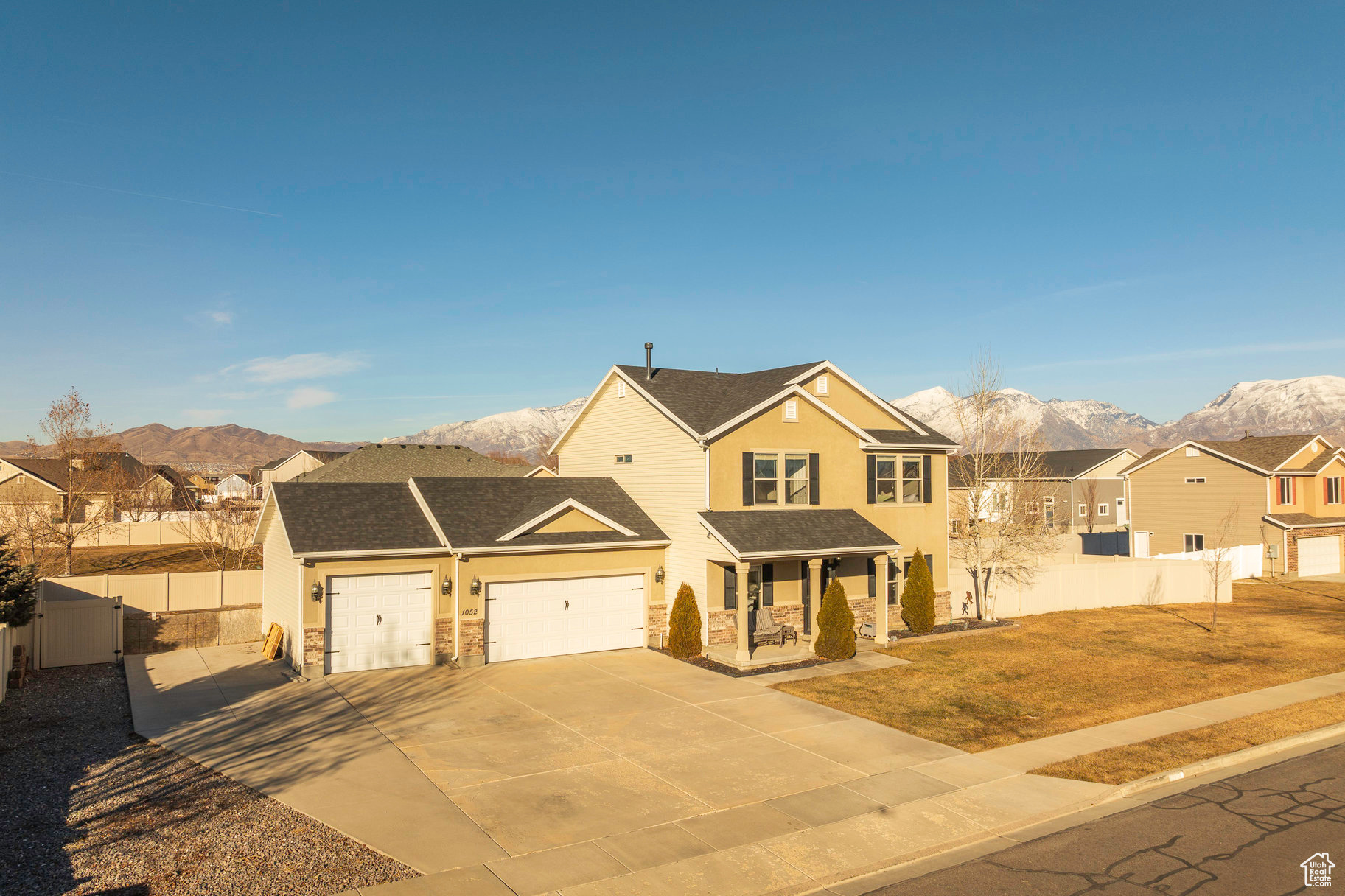 Single-Family Home in Lehi with Over 1/3 Acre Lot.  This property is a truly rare opportunity for buyers who prioritize ample parking, expansive garage space, and outdoor living space. Situated on over 1/3 acre of landscaped grounds, the home features a large three-car garage with floating shelf storage, an extended driveway, and RV parking-with space to accommodate up to six vehicles across the driveway and parking area combined.  The backyard is exceptionally large, offering endless possibilities for creating your ideal outdoor space, from entertaining areas to gardens or play spaces. A gazebo-covered patio adds a comfortable spot to relax and enjoy the peaceful surroundings. Inside, the home has been thoughtfully updated with a brand-new roof installed in 2024, new flooring, modern fixtures, and fresh paint throughout.  With three spacious bedrooms, 2.5 bathrooms, and a versatile main-level flex space perfect for an office, formal dining, or additional living area, this home offers the adaptability to fit your lifestyle. Rarely does a property in Lehi offer this much parking, lot size, and potential at such an accessible price point-don't miss this incredible opportunity. Buyer and Buyer Broker to verify all info.