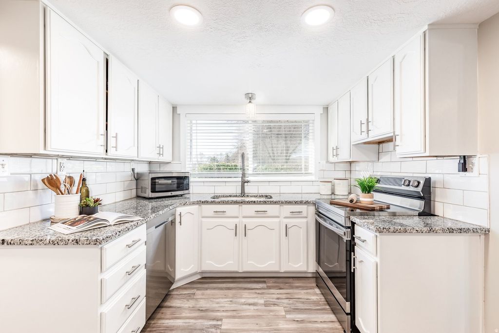 Photo of 1556 W 13400 S, Riverton, UT 84065 (MLS # 2140507)