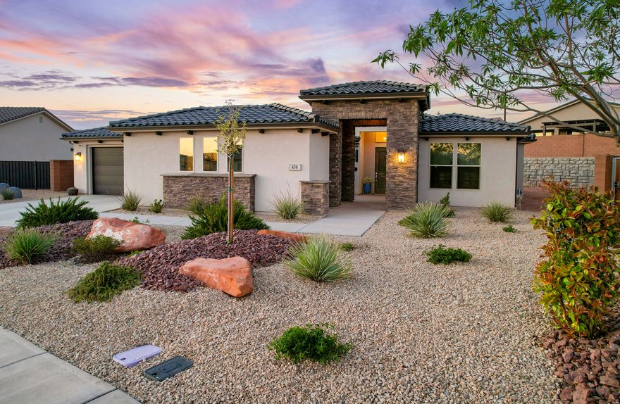 Set within the sought-after Brio community, this 2,687 sq ft Crimson plan offers a unique opportunity to create a personalized retreat in one of Southern Utah's most amenity-rich neighborhoods.  Inside, the home features an open layout with a coffered ceiling and 16-foot sliding glass door leading to an oversized covered patio. The kitchen includes granite countertops, stainless appliances, and two pantries. The primary suite is spacious, with dual vanities, a soaking tub, and separate shower. Two guest bedrooms each offer private ensuite baths, and a French-door office faces the front courtyard.  The true value here is in the potential. The backyard is unfinished, offering a blank canvas to design an outdoor space tailored to your lifestyle. While the rear wall may not appeal to everyone initially, it provides privacy and a clean backdrop for thoughtful landscaping. With the right design--orienting seating and gathering spaces back toward the home and extending the patio--the space can feel both private and inviting.  The large side yard adds even more opportunity, with room for a pool and the potential to create a private, resort-style setting. Future access from the primary suite could further enhance indoor-outdoor living.  This is a chance to build your own outdoor environment rather than inherit someone else's choices, and the home is priced with that in mind.  Brio offers a resort-style lifestyle with pools, hot tubs, pickleball, tennis, trails, fitness center, and a full calendar of community events and activities.