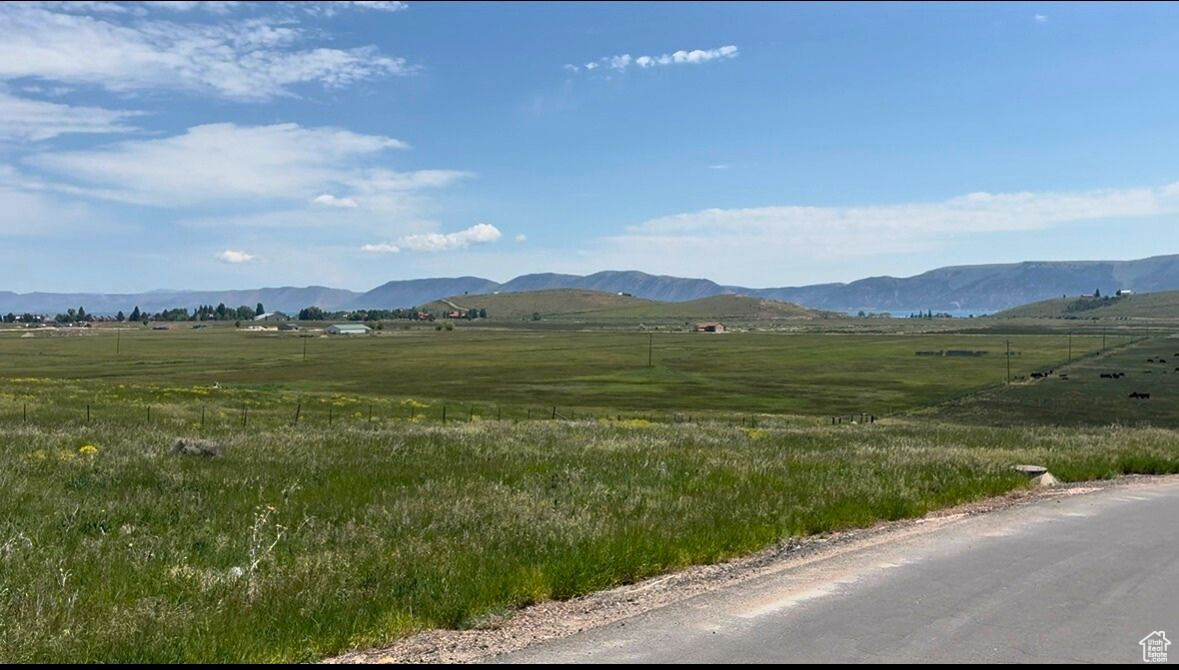 Unlock the best of Bear Lake living on this gently sloped 0.29-acre lot in Sweetwater Golf Course Sub 4. Enjoy year-round, paved access via Country Club Dr. This lot's position delivers excellent sun, partial lake and valley views, Utilities (culinary water, power, sewer) are in the road; just pay the standard water hookup fee and start your build with minimal excavation. Sweetwater HOA amenities-pool, tennis courts, and more-add resort-style fun (buyer to verify package). Whether you want a weekend retreat or a full-time haven, this parcel makes it easy. Come stake out your slice of the Bear Lake lifestyle today!