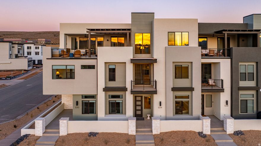 The Pacific Sands boasts 5 bedrooms and 5 bathrooms within 3,625 square feet of thoughtfully designed space in Desert Color. Featuring a gourmet kitchen, built-in mini bar, and generous rec rooms, this home is perfect for hosting family and friends. Bunk rooms ensure everyone has space to unwind and enjoy. LVP flooring throughout and tiled showers in every bathroom offer comfort and style. Relax on the second-floor deck with a hot tub and fire table, overlooking the serene surroundings. Just steps away from the new Desert Color amenity it is the ideal vacation retreat.