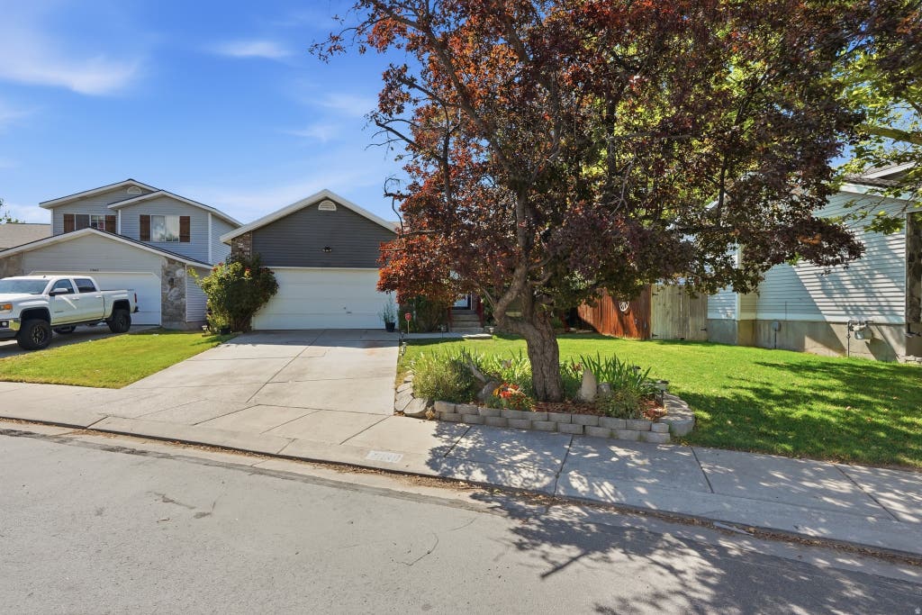 Photo of 7930 S PALLADIUM DR, West Jordan, UT 84088 (MLS # 2173751)