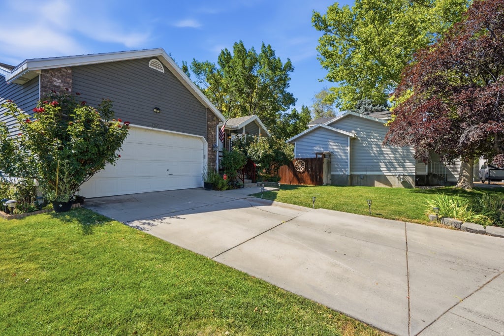 Photo of 7930 S PALLADIUM DR, West Jordan, UT 84088 (MLS # 2173751)