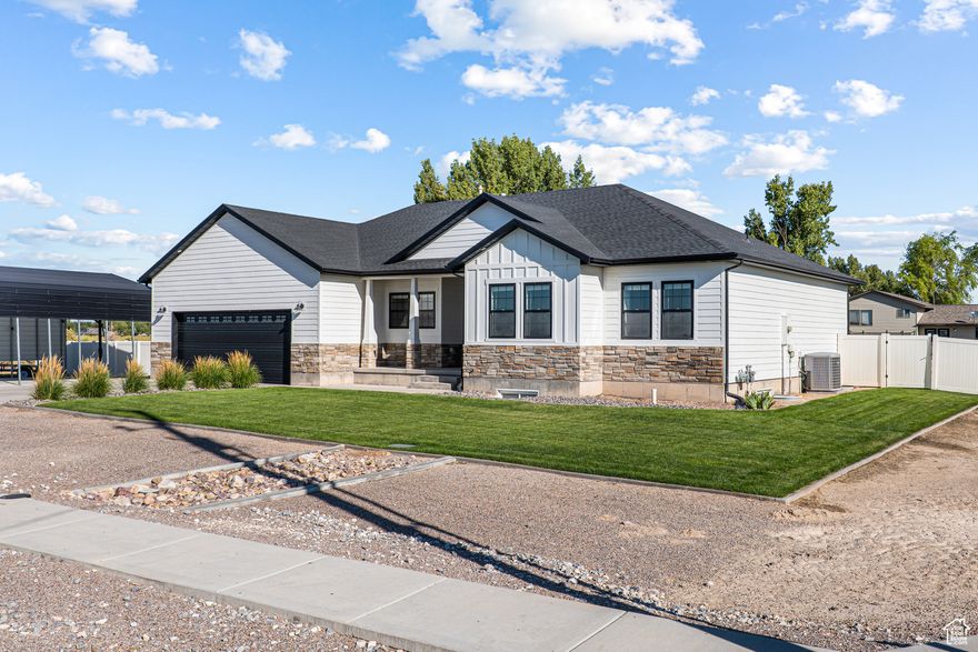 Immaculate Modern Rambler on a large, fully landscaped lot in Delta! This well-cared for home blends charm and style with fresh updates, open living spaces, and abundant natural light. Enjoy the beautiful yard-perfect for those summer gatherings, gardening, or simply relaxing. Enjoy this beautiful kitchen with premium appliances, walk-in pantry, and ample storage. Outdoor perks include large patio, RV parking, covered basketball court, fenced yard, mature lawn, and storage shed.   This home has the New Home feel, without the new construction headache! It already has the landscaping, window coverings & appliances! A rare find that's move in ready and waiting for you to make it yours!