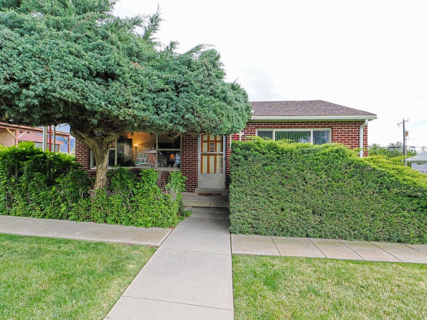 Charming brick bungalow in the heart of Kaysville! Immaculate landscaping with private fenced yard. Quiet street with mountain views. Meticulously cared for home. Two bedrooms with a pocket door to separate living room for peace when you're entertaining guests or want to get away! Semi formal dining, master suite with private bath with large walk in closet. Two gas fireplaces, multiple sheds, workbench in garage, built in benches on the covered patio perfect for bbqs and hanging with family and friends. Don't miss this gem close to shopping and everything Kaysville has to offer! Square footage figures are provided as a courtesy estimate only. Buyer is advised to obtain an independent measurement.