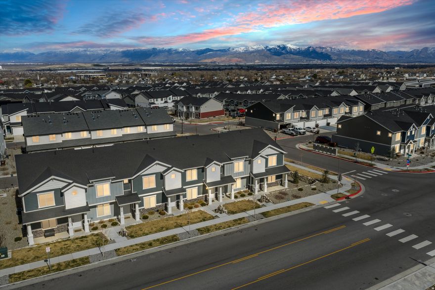 Welcome home! Perfectly suited for first-time buyers or small families, this thoughtfully designed home offers an inviting open-concept floor plan filled with beautiful south-facing natural light. The bright and airy living spaces create a warm and welcoming atmosphere ideal for both everyday living and entertaining. Enjoy an unbeatable location with convenient access to Salt Lake City International Airport, world-class ski resorts, and vibrant downtown Salt Lake City. The brand-new Cypress High School is located directly across the street, adding exceptional convenience. Experience maintenance-free living with outstanding community amenities including pickleball courts, scenic hiking and biking trails, a swimming pool, playground, and clubhouse-providing recreation and relaxation for all ages. All information is deemed reliable but not guaranteed. Buyer is advised to verify all information, including square footage and acreage, to their own satisfaction.