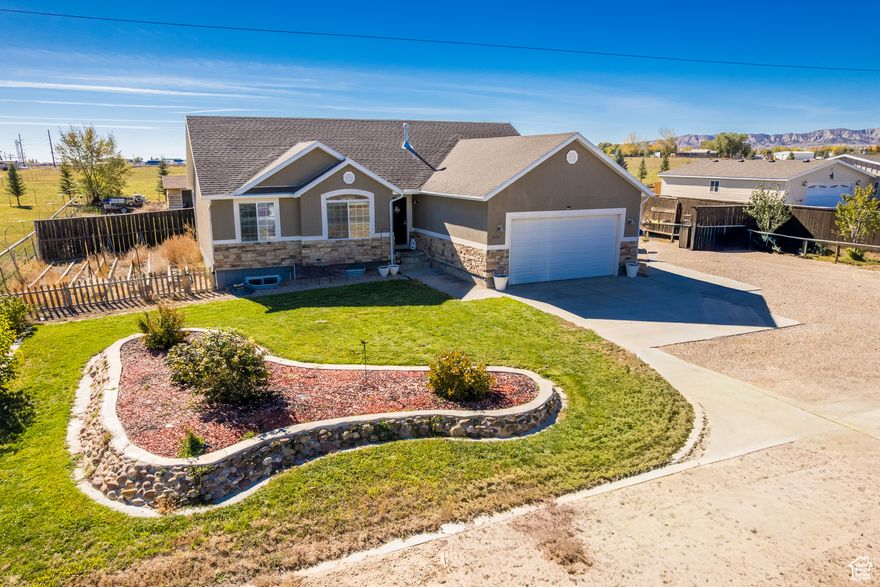 This spacious 2,900 sq. ft home offers 3 bedrooms and 2 bathrooms on a large .73-acre lot. The basement is framed for 3 additional bedrooms and plumbed for a full bath as well as a giant family room-perfect for future expansion. Enjoy mature fruit trees, a storage shed, and ample parking for RVs or extra vehicles. With a functional layout and excellent potential, this property offers space, comfort, and opportunity in one great package.  Square footage figures are provided as a courtesy estimate only. Buyer is advised to obtain an independent measurement.