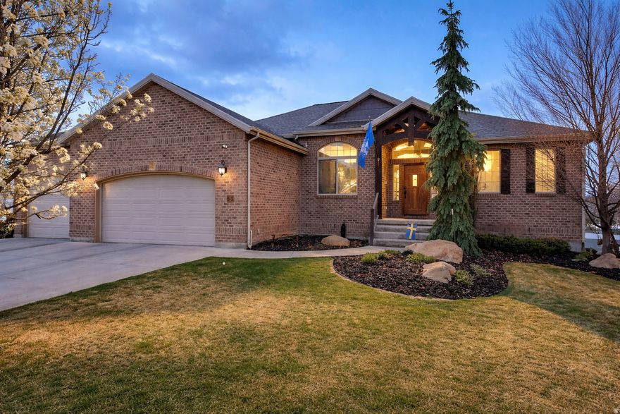 This home isn't just unique... It's unmatched!  Perfectly placed in Westwood on a rare double corner lot, this home delivers privacy and views.  From the jaw-dropping chef's kitchen and fully loaded butler's pantry to the next-level outdoor living space and massive 40x40 shop. Every inch of this home was designed to impress, entertain, and elevate everyday living.   CHEF'S KITCHEN + Butler's Pantry (A True Showpiece) Stunning, oversized kitchen with statement lighting. ZLINE appliance package: double ovens, 7-burner gas cooktop, built-in microwave. Double fridge/freezer with customizable temp zones (use as all fridge, all freezer, or both!). Massive island with built-in warming drawer. Pull-out cabinetry + exceptional storage throughout. Private balcony access right off the kitchen.  NEXT LEVEL BUTLER'S PANTRY! Large prep island. Additional fridge + ice machine, Sink + extensive storage.  OUTDOOR LIVING STEALS THE SHOW! Covered outdoor kitchen built for hosting: Built-in BBQ, mini fridge, microwave. Fireplace + mounted projector for movie nights. Integrated sound system. Permanent trim lighting on the home and shop  customizable for holidays, events, or everyday ambiance. Walkout basement for seamless indoor/outdoor flow. In-ground trampoline + swing set. Fully fenced yard with lush, mature landscaping. Complete drip & sprinkler system for easy maintenance. Basketball hoop and Dogrun.  SPACE FOR EVERYONE 5 bedrooms | 3 full bathrooms. Beautiful master suite with separate tub & shower. Double sided gas fireplace in the master bedroom. Mud room, Fully finished basement featuring: 4 bedrooms, Kitchenette (sink, microwave, mini fridge), Bonus exercise room, Large storage space.  GARAGE, SHOP, & PARKING (This Is Where It Gets Serious). 3-car attached garage, Dedicated RV parking (2 spaces!), 40x40 DREAM SHOP, 3 oversized bays (2 at 12', 1 at 14'), Extra deep for toys, trailers, or workspace, Heated + sound system, Garage Vacuum, Bathroom, Separate water heater (also services outdoor kitchen).