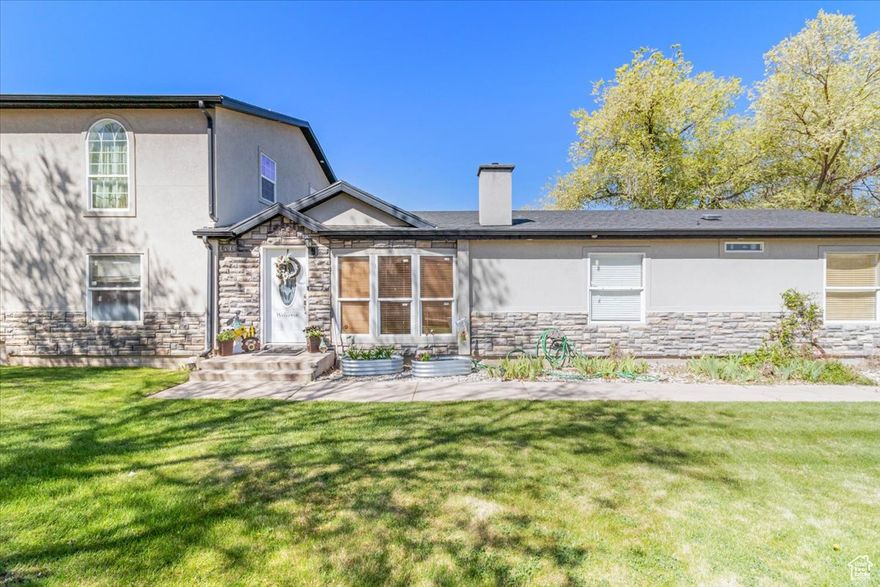 Wow! Prepare to be amazed by this beautifully maintained home that has it all. The luxurious master suite invites you to relax by the gas fireplace, unwind in the spacious walk-in shower, and enjoy the convenience of a generous walk-in closet. Step out onto your private deck to enjoy peaceful evenings, or watch the kids play in the large fenced backyard. With five bedrooms, three bathrooms, and two expansive family rooms, there's plenty of room for everyone. Entertain in style in the formal dining room, or get cozy on wintry nights next to the wood/coal-burning stove. This home is designed for comfort and efficiency with two furnaces and two A/C units. You'll also love the oversized garage complete with a workshop area-perfect for hobbies or extra storage. Don't miss your chance to own this versatile and welcoming home. It has everything you've been looking for-and more!