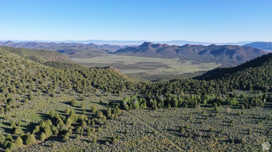 WOW! A truly 1 of a kind property. The highest elevation private owned property on Pine Valley Mtn. at 7800ft. 640 acres completely surrounded by forest service. Imagine the recreational opportunities of secluded Lodge, Nightly Rental Cabins, Glamping sites, Yurts. Backpacking on the Summit Trail loop that goes right through the property. Seasonal streams, aspen groves, oak groves. New access road right to the top of the property. Partially fenced. Zoned Agriculture. Well start card approved by State of Utah Division Water Rights. Just over an hour from St George, 30 minutes from Cedar City. Endless Possibilities.