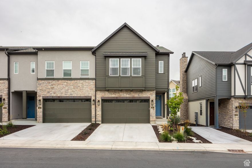 Experience modern living at its finest in this stunning newer-construction end-unit townhome, perfectly situated in the highly desirable Songbird Cove community in Lindon. Built in 2024, this beautiful home seamlessly blends space, comfort, and contemporary design-ideal for families, multi-generational living, or anyone seeking a versatile home that balances privacy and style. Boasting 4 bedrooms and 4 bathrooms, the home is thoughtfully designed with a bathroom on every level for ultimate convenience. The fully finished basement features a private apartment suite or mother-in-law setup, perfect for extended family, guests, or a dedicated home office. With 2,372 square feet of living space, you'll love the open-concept floor plan, 9-foot and vaulted ceilings, and the bright, welcoming atmosphere throughout. Step outside to your covered patio and take in the breathtaking views of the Wasatch Mountains. Enjoy access to exceptional community amenities, including a private pickleball court and beautifully maintained open spaces. A spacious 2-car garage provides both security and convenience. Located in East Lindon, this home offers walkable access to the nearby elementary school and is just minutes from I-15, Silicon Slopes, and countless outdoor recreation opportunities throughout Utah Valley. Don't miss this rare opportunity to own a move-in-ready home in one of Lindon's premier communities!