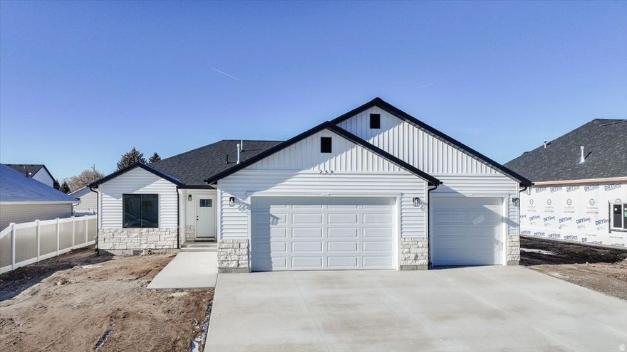 Brand new single-family home in a new subdivision in Preston, Idaho. This three-bedroom, two-bath home features an open-concept layout with a spacious living, dining, and kitchen area. Includes a three-car garage and modern finishes throughout.  A great opportunity to own a new home in a growing neighborhood.