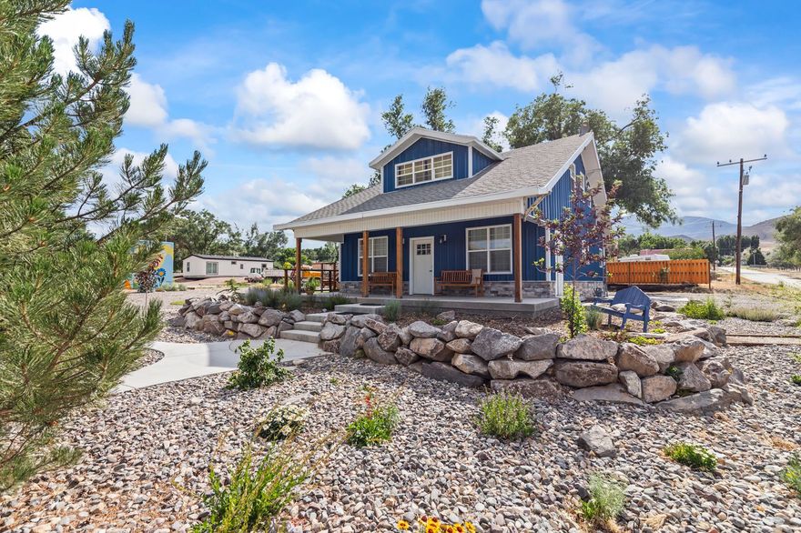 This property has performed well seasonally as a short term rental. It could also be divided into 2 long term rental units which are in short supply in Marysvale, Utah.  Located on Main Street this historical home is fully remodeled and comes thoughtfully furnished in mid-century modern charm. As you step inside the ground floor, you're greeted by the inviting ambiance of a lovingly renovated space that seamlessly blends historic character with modern convenience. The open-concept layout features a beautifully appointed kitchen, with extra  wide countertop bar sitting space. This kitchen, with its butcherblock countertops and state-of-the-art appliances, is a cook's dream and open to the dining area and the large living room area.  It is the perfect spot to cook and entertain.. This level boasts a tranquil bedroom and a thoughtfully designed bathroom,with a clawfoot soaking tub and walk-in shower,  as well as a laundry area for your convenience. One of the standout features of this floor is the covered patio, a peaceful escape where you can sip your morning coffee or enjoy an evening glass of wine while taking in the fresh mountain air. Ascending the staircase to the upper unit, you'll discover two  bedrooms, a sitting area and another well-appointed bath,and kitchen. The balcony, perhaps the crowning jewel of this upper unit, offers panoramic views of the breathtaking mountains surrounding Marysvale. This home also has several large windows creating beautiful warm light.  The home has a dual control heating and air conditioning system, so that each unit works independently.  The home is efficiently cooled in the summer and cozy warm in the winter.                   Outside, the property is fully landscaped. It features a stunning low maintenance landscape with over 5 dozen trees, shrubs and native flowers. There is an automatic watering system, ensuring that the beautiful gardens  remain lush and vibrant throughout the seasons. This home is more than just a place to stay; it's an experience waiting to unfold. Situated in the ATV capital of the world, Marysvale is a gateway to adventure. From thrilling ATV rides on rugged trails to exploring the nearby national parks, this location invites you to immerse yourself in nature. After a day filled with outdoor activities, retreat back to your charming abode, where comfort and style await. Whether you're a couple seeking a romantic escape or a family craving adventure, this historic home on Main Street offers not just a place to stay, but a memorable experience in beautiful Marysvale, Utah. Come create your adventure! must show proof of funds or pre approval letter before showing. The seller needs a 24 hour notice to show the home.