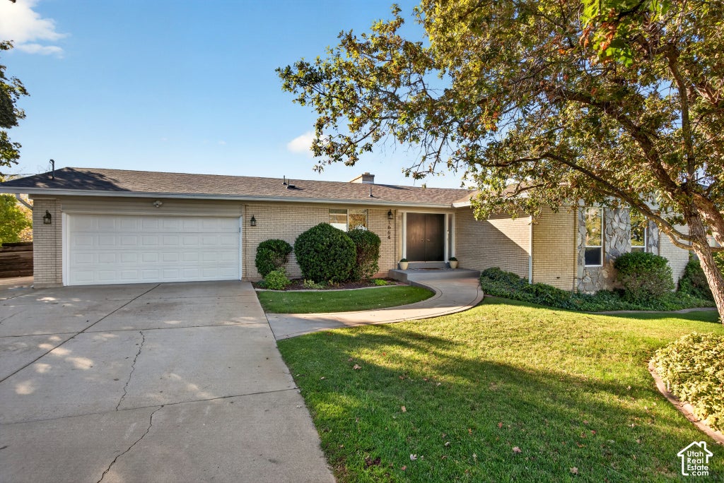 Photo of 1664 E GORDON AVE E, Layton, UT 84040 (MLS # 2188889)