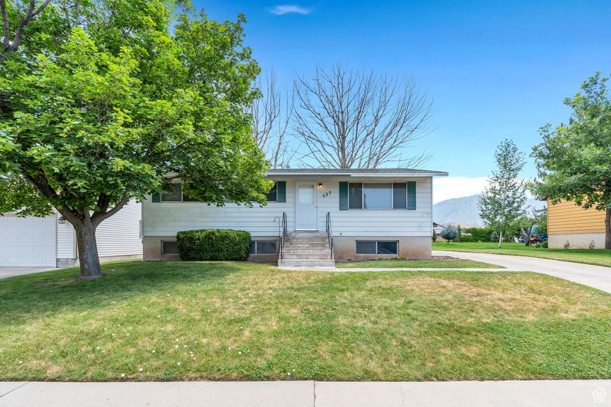 Very clean spacious home in an established neighborhood backing the school yard. Nice views of the mountain. Easy access to freeway and commercial. Full spacious basement ready to be finished into living space or ADU. Large yard and room for a garage/shop. The large trees in the backyard have been removed. All figures per county records. Buyer to verify.