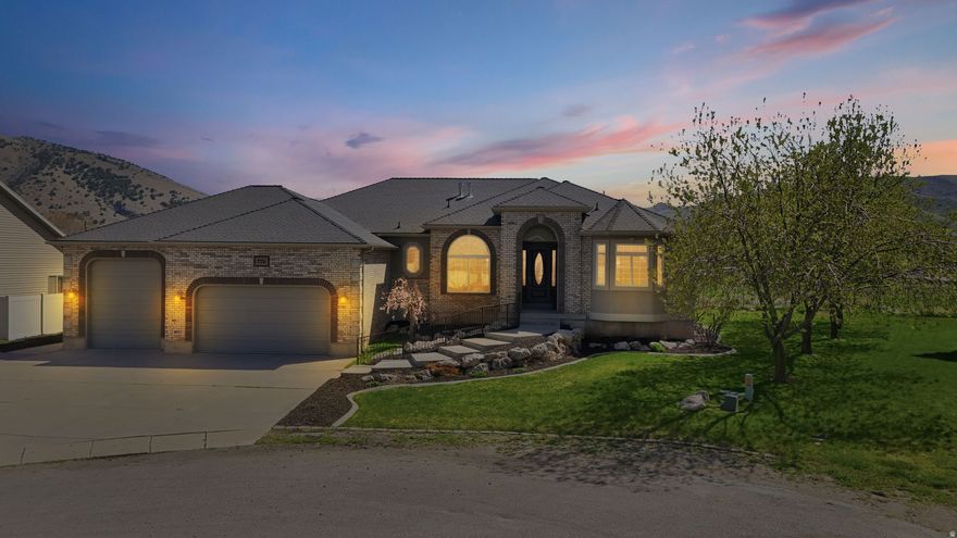 Located in a quiet cul-de-sac in the heart of Morgan Valley, this six-bedroom rambler offers space, comfort, and beautiful mountain views. Featuring two full kitchens, a dedicated home office, and a large garage, this home is perfect for entertaining or multi-generational living. Enjoy relaxing on the deck while taking in the stunning surroundings in this desirable Morgan neighborhood.