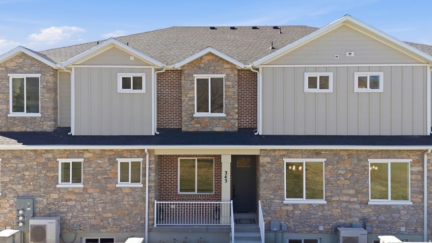 ***USDA 100% FINANCING AVAILABLE***Experience incredible value with every upgrade already included as you become the first to live in this move-in ready townhome filled with luxury finishes throughout. Beautiful mountain views. From the moment you enter, the quality and attention to detail set this home apart from other new construction in the area. The open main level features a stylish kitchen with tile backsplash, farmhouse sink, Frigidaire Gallery appliances, crown molding, and soft-close cabinets and drawers, creating a functional and inviting space for everyday living and entertaining.  The upper level offers a spacious primary suite with large windows that capture mountain views and abundant natural light. The ensuite bathroom includes dual vanities/sinks, a Euro-glass shower door, and a large walk-in closet. A flexible loft area at the top of the landing provides space for a home office, reading nook, or additional living area. Two additional bedrooms and a full bathroom with tile flooring complete the upper level.  The finished basement adds valuable living space with the option to add an additional bathroom, wet bar, or secondary kitchen setup.  Additional features include an oversized two-car garage with extra height for storage, private outdoor storage space, and fully landscaped grounds with automatic sprinklers, pressurized irrigation, and drip lines.  All upgrades are included in the purchase price. Conveniently designed, beautifully finished, and truly move-in ready. Schedule your show today and COME AND SEE THE DIFFERENCE AND VALUE THEY OFFER!     Square footage figures are provided as a courtesy estimate only and were obtained from builder plan.  Buyer is advised to obtain an independent measurement.