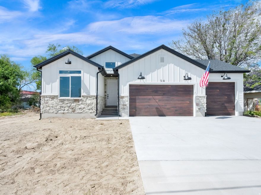 BRAND NEW HOME Built in 2026 Rambler with 3 Car Garage in the Heart of Murray!!   This Brand-New Build is in a GREAT LOCATION just South of IMC Hospital and Costco with Quick Access to I15.  Open Floor Plan with Vaulted Ceilings, Custom Cabinetry with Walnut Island and Hood, Soft Close Doors and Drawers, Quartz Countertops and Double Oven.  Amazing Master Suite with Large Shower and Walk in Closet.  Basement Entrance with RV Parking to the side of the 3 Car Garage.  No HOA.  Hard to find a BRAND-NEW Home in Murray in such a Central Location with 3 Car Garage and Basement Entrance.  Home was Built by Licensed Contractor and Murray High School Construction Class Under the Direction of Certified Contractor.  Come See to Appreciate!!