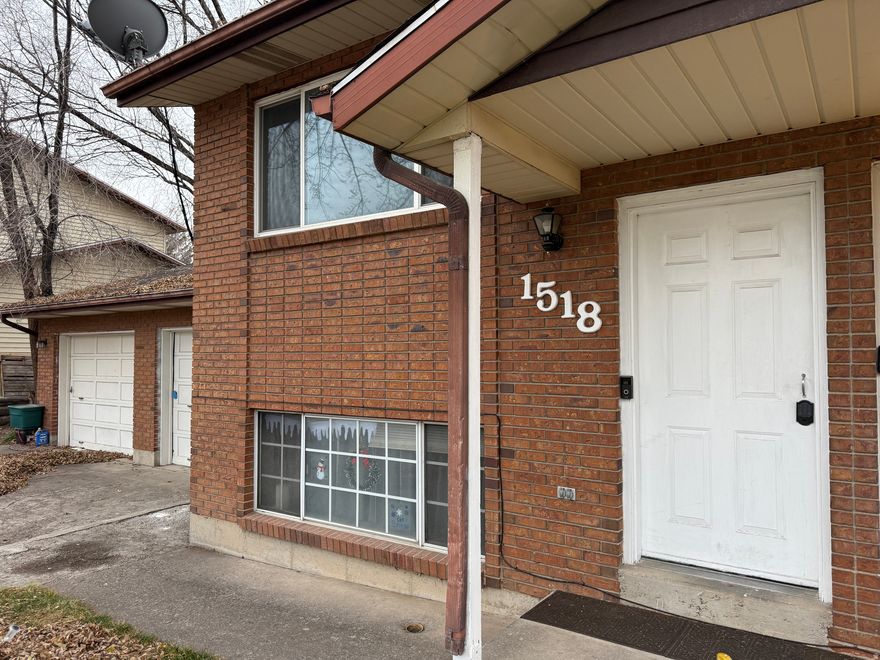 Welcome to this refreshed and move-in ready twin home nestled in a peaceful Springville neighborhood! Recently updated with brand-new paint, new carpet, and new light fixtures throughout, this home feels clean, bright, and ready for its next owner. Perfect for first-time buyers, investors, or anyone seeking affordable living with no HOA, this home offers a cozy yet functional layout. The inviting living room features a beautiful fireplace-ideal for relaxing evenings at home. The kitchen provides great everyday functionality and space to make it your own. Step outside to a fully fenced backyard, perfect for pets, kids, or entertaining. Enjoy summer BBQs or quiet mornings on the covered patio, and appreciate the convenience of a 1-car garage plus additional driveway parking. Situated on a 0.15-acre lot, this property offers privacy and space while remaining close to parks, schools, shopping, and quick access to I-15 for an easy commute. With fresh updates and strong value, this one won't last-move quickly to secure a clean, affordable home in a desirable Springville location.