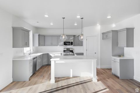 Photo of 2409 W 2950 N #101, Farr West, UT 84404 (MLS # 2112504)