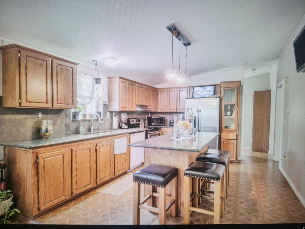 Photo of 5075 W 4700 ST S #117, Kearns, UT 84118 (MLS # 2141788)