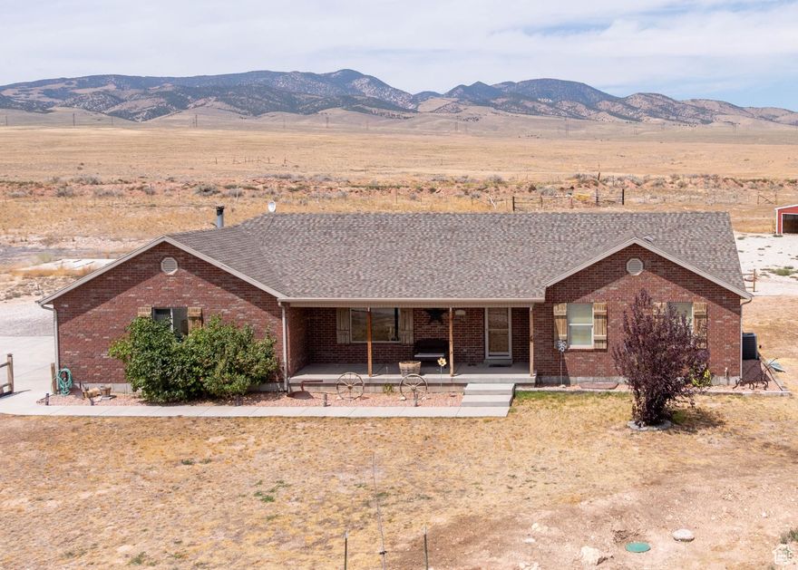 Experience the rare opportunity to own nearly 20 acres of stunning Central Utah landscape at an unbeatable value. Nestled in the peaceful town of Redmond, this 19.46 acre property offers space, freedom, and views you simply will not find at this price point. The updated 4,282 square foot home features six spacious bedrooms, three and a half bathrooms, fresh interior paint, new bathroom lighting fixtures, and a brand new sprinkler system. The home is on propane, well water, septic system, and has reliable cell service and Wi-Fi, making rural living feel effortlessly connected. The fully finished basement includes a private exterior entrance and is ready to be customized into whatever suits your needs, whether that is guest quarters, a rental, a home business, or your dream entertainment space. Outside, you will find a large barn with water and power close by for future hookup. Three shares of Piute irrigation water is included in the sale from the canal directly behind the home. To utilize the irrigation water, a weir will need to be installed. The property is surrounded by sweeping 360 degree views of the Sevier and Sanpete Valleys, framed by mountain backdrops in every direction. Whether you are looking to start a homestead, invest in land, or simply enjoy wide open space, this property delivers more than just a home. It offers an incredible lifestyle. Do not miss your chance to own this much land, with this much potential, at a price that is hard to beat.