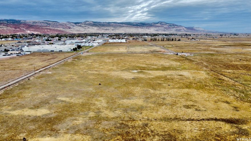 This listing is a neighboring property  to Wal-Mart  that includes two separate parcels that total 20.14 acres. There is a well right included that was drilled for AG use and six shares of Sevier Valley Canal Co. With Richfield City constantly expanding, this is a perfect location that will get a lot of attention.