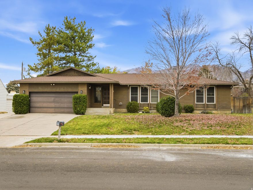 BACK ON MARKET with so many changes including new carpet and paint! Welcome to 2619 E. Sundance Drive, where mountain views meet modern comfort in the heart of Sandy. This beautifully maintained home offers the perfect balance of functionality and style with spacious living areas, thoughtful updates, and large windows that flood the home with natural light. Enjoy a gourmet kitchen, cozy fireplaces, and a serene backyard oasis-ideal for entertaining or relaxing under the stars. Nestled in a quiet, well-established neighborhood near world-class ski resorts, hiking trails, and top-rated schools, this home is a rare gem with easy access to both nature and city life. Come experience the lifestyle you've been dreaming of!