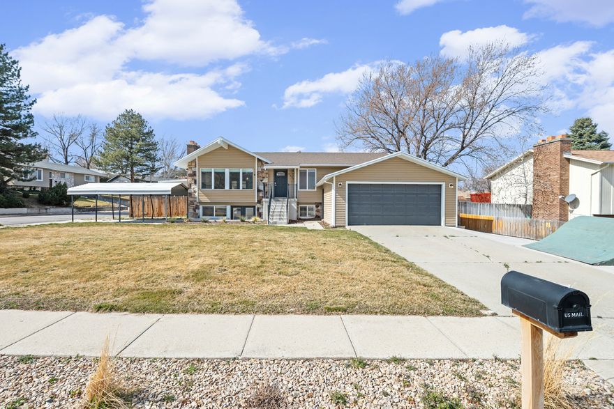 Beautifully updated 5-bedroom, 2.5-bath home in a prime Sandy location with mountain views, and quick access to world-class skiing, shopping, dining, and outdoor recreation. The open-concept layout features updated living areas, kitchen, and baths. Lower level includes a separate-entry apartment with 2 bedrooms, 1 bath, and full kitchen, offering great flexibility for multi-generational living, guest space, or rental potential. Enjoy the hot tub and a layout built for both comfort and versatility.