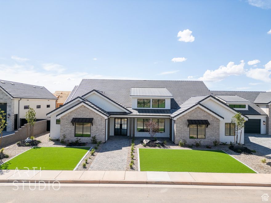 Absolutely stunning single-level estate by New Trend Construction, situated on an expansive lot of over half an acre. This custom-designed property boasts a true backyard oasis complete with a saltwater pool and integrated spa, motorized pool cover, professional-grade outdoor chef's kitchen, gazebo, pickleball and basketball court, and an upgraded in-ground trampoline-perfect for entertaining or private resort style living. Inside, the thoughtfully designed floor plan spans over 5,000 sq ft all on one level-a rare find. The open-concept living area features  soaring vaulted ceilings and a gourmet kitchen equipped with a GE Monogram appliance package, built-in fridge/freezer, dual dishwashers, and an oversized butler's pantry to meet the highest culinary standards. The luxurious primary suite offers a tranquil retreat with a fireplace, vaulted ceilings, and a sprawling his-and-hers closet. A second spacious living room also features vaulted ceilings, ideal for additional entertaining or relaxation space.