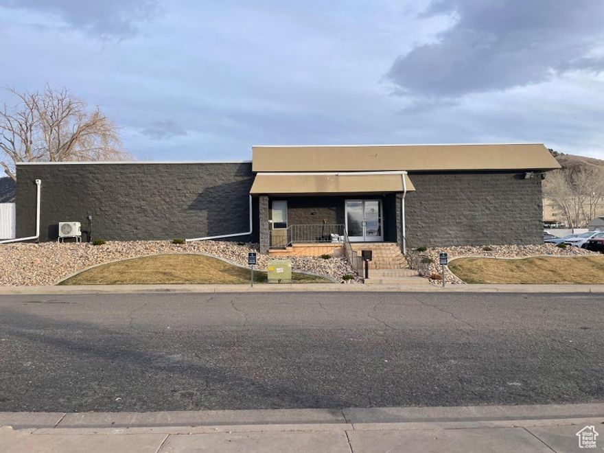 Income producing property! Fantastic building in a fantastic location with so much opportunity! The building is 8859 sq ft with 13 office spaces, 4 large multi purpose rooms, 1 large conference room, a kitchen area and a large gym, ample parking and outdoor area. Immediate rental income with a tenant in place until 10/1/2027. Don't delay, come see today!