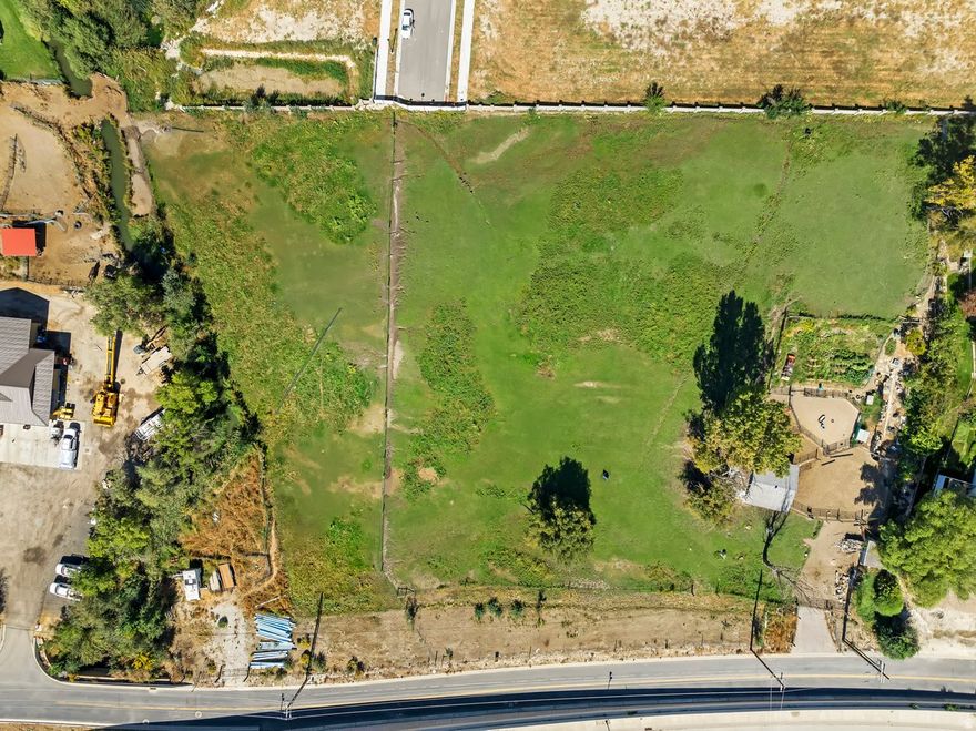 Amazing rare 1-acre estate lot in the heart of South Jordan! Build your dream home and create your own private oasis with plenty of space for a luxury residence, pool, shop, gardens, sports court, and more. Opportunities to own a large estate lot in this highly desirable South Jordan location at this price are extremely rare. Enjoy the perfect blend of privacy, open space, and convenience with close access to shopping, dining, schools, parks, and freeway access. Buyer may help determine the final lot footprint during the lot split process. Buyer responsible to bring utilities to the property and cooperate with South Jordan City requirements for final lot approval and split. Don't miss this incredible opportunity to build a custom estate property in one of Utah's most sought-after communities!