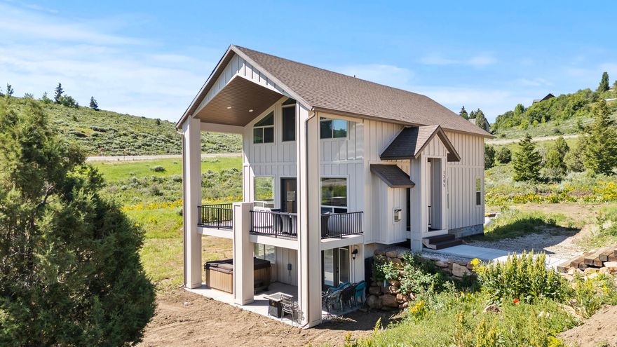 Totally redone inside and out! This home has been created to entertain all of your guests! Plenty of sleeping and entertaining space. Even better, there is a place for everyone to park. Bring your boats and side by sides in the summer and your snowmobile trailer in the winter, and still have parking space to spare. The views from the deck are unparalleled of the lake, or spend some time in the hot tub relaxing after a long day on the slopes. Don't miss out on the opportunity this home has, come see it today! Buyer to verify all information.