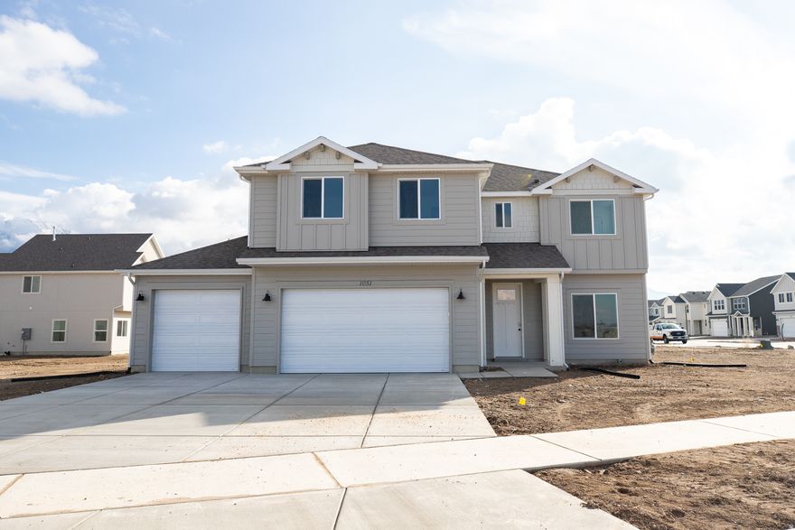 AMAZING INCENTIVE AVAILABLE! **SPECIAL RATE INCENTIVE** THROUGH OUR LENDER OR $20,000 TO USE YOUR WAY WITH THE LENDER OF YOUR CHOICE! This is our Must-See New Arrowhead Springs Community in Salem! This beautiful home was built by Flagship Homes and features 4 bedrooms, 2.5 bathrooms, quartz slab countertops, painted cabinets, laminate flooring on the main level, landscaped front yard, 3 car garage, and backyard (can be landscaped for an additional charge). The primary bedroom has a vaulted ceiling, large walk-in closet, and dual sinks with a separate tub/shower. Call SETH more information or stop by our model home at 1074 N 1020 W Salem, Utah 84653 for a tour. Model home hours: Monday-Saturday 11 AM - 6 PM. Buyers to verify all information. Square footage is from house plans.