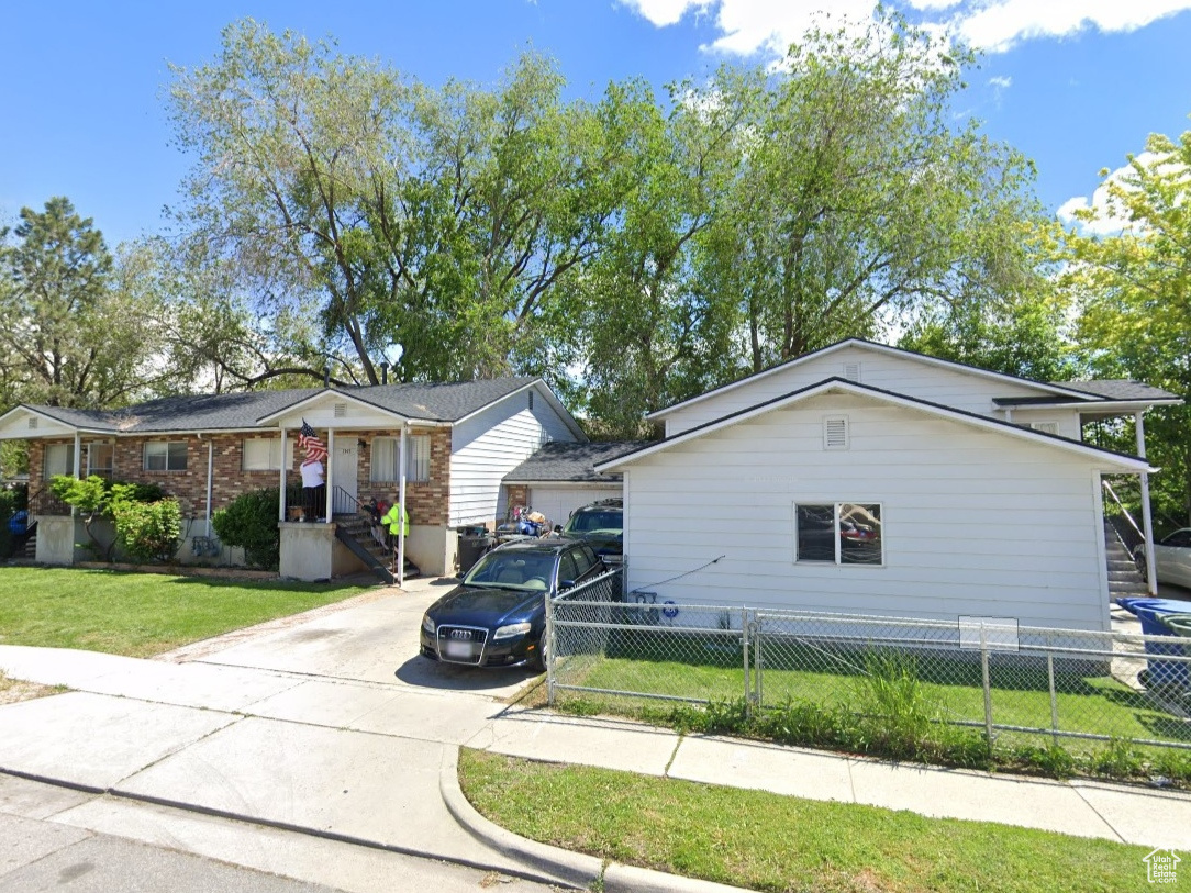 Rose Park (Salt Lake City) side by side triplex. Each unit has its own 2 car garage. New roof and central air in all units. Long terms tenants (10+ years) in 2 of the units. The west unit 1719 was added and built in 1997. Do not disturb tenants. Owner/Broker. No showings without accepted offer. Leasing info in agent remarks.